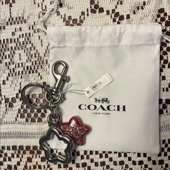 Coach Silver and Pink Star Keychain NWT with dusty - Picture 1 of 5